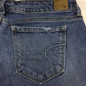 American Eagle super distressed skinny’s